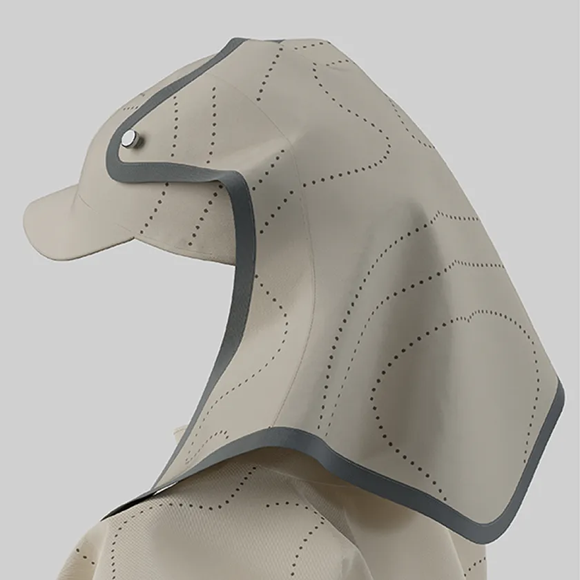 Close-up of a beige sun-shade hat, HOPE WEAR for Play, showing breathable two-layer construction with punching fabric and dotted patterns.