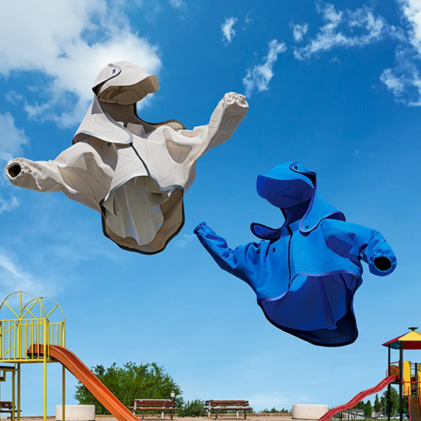 Image visual of a beige and blue HOPE WEAR for Play top-and-bottom set floating under a blue sky, expressing comfort for park play on hot days through heat-blocking performance.