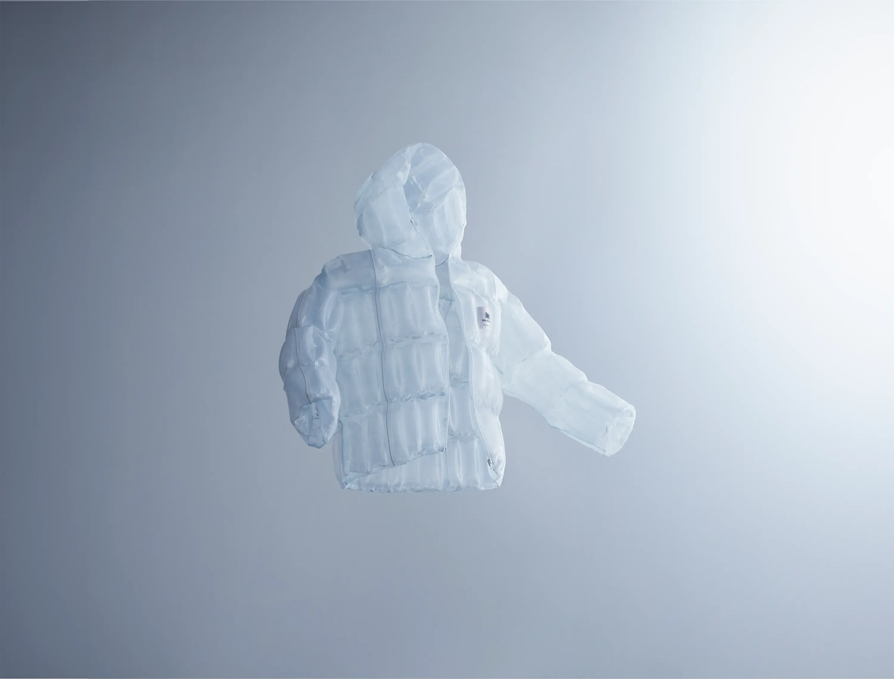 A transparent DOWN-LESS DOWN JACKET floating in mid-air, revealing its structure as a solar-heat-generating jacket composed solely of layers of air.