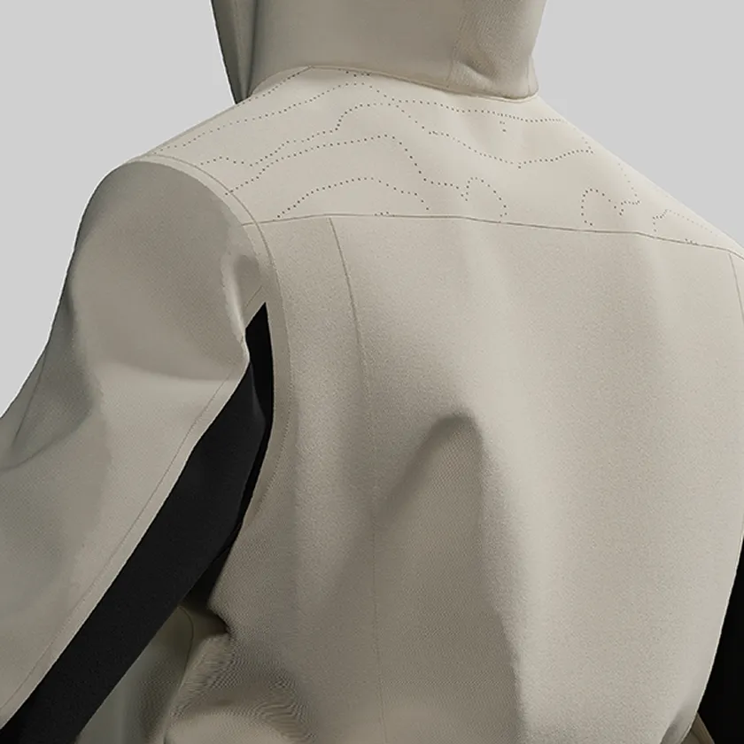Close-up of the upper back of HOPE WEAR for Farm Type A with a beige yoke, dotted wave pattern, and black fabric side panels.